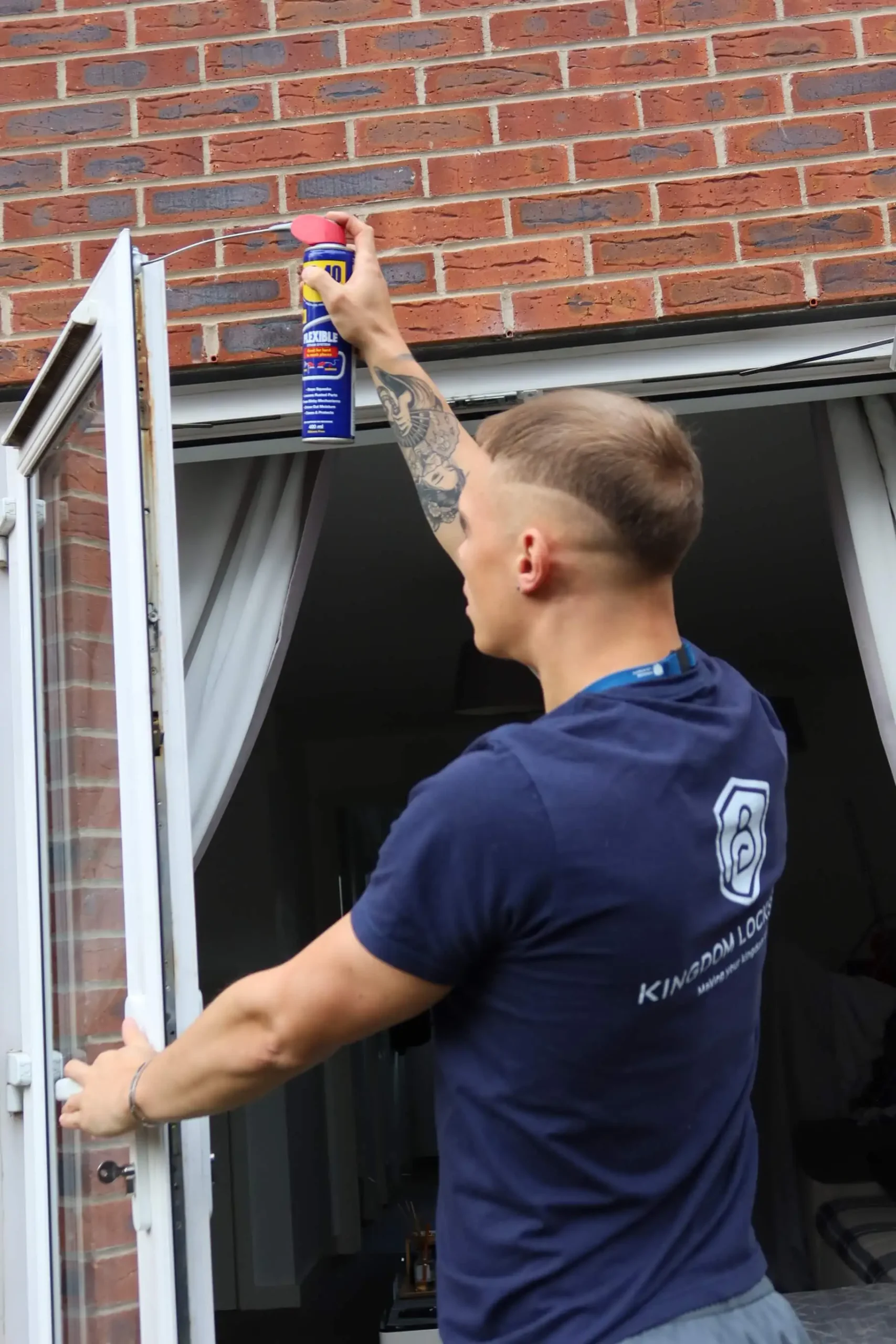 Adjusting a uPVC door mechanism at a customer home